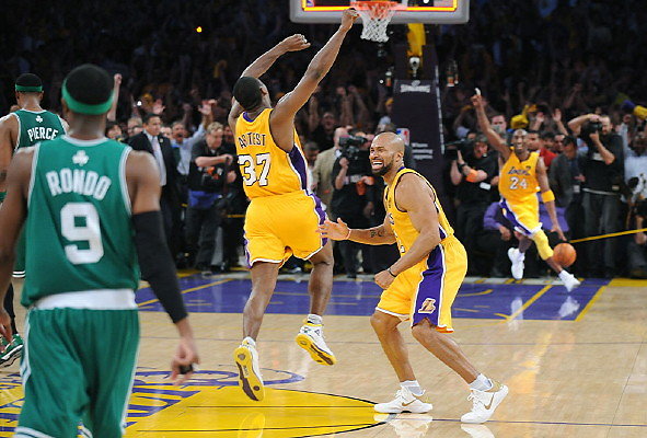 Staples Center.BBall.Court.Pixx10 - Lakers Derek Fisher (2), Ron Artest (37) and Kobe Bryant (background) begin to celebrate after their 83-79 victory over the Boston Celtics earned them the NBA championship on Thursday night at Staples Center.