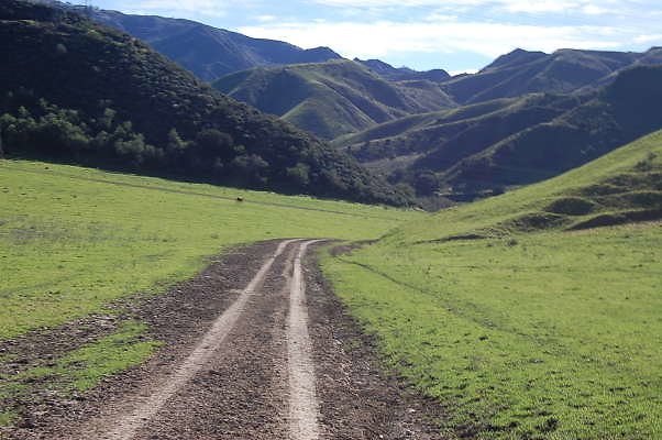 Newhall Ranch.Rough road past Cattle gate