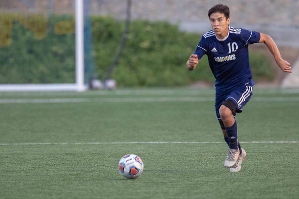 sports coc soccer versus santa barbara EM-4-990x660 - Ceasar Dominguez dribbles the ball down the field in a game against Santa Barbara. College of the Canyons soccer played an even game against Santa Barbara Tuesday, September 25. Eddy Martinez/The Signal.