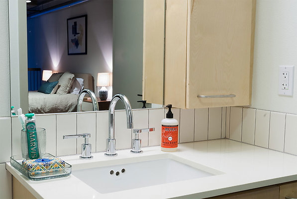 bathroom-sink-with-soap-and-toothpaste-inside-new-1-bedroom-apartment-25-XL