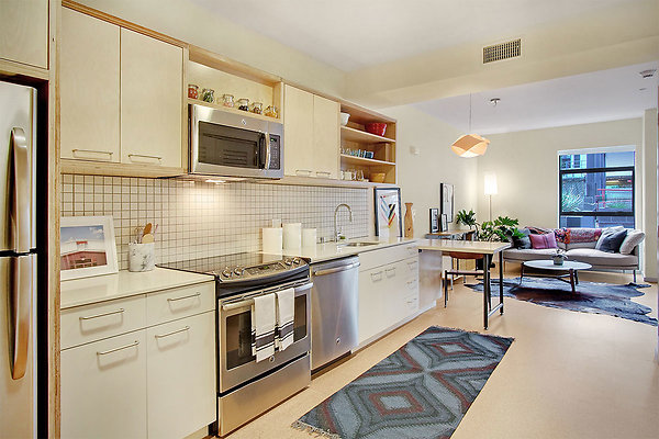 30-kitchen-with-white-countertops-and-cabinets-in-new-1-bedroom-apartment-2-XL